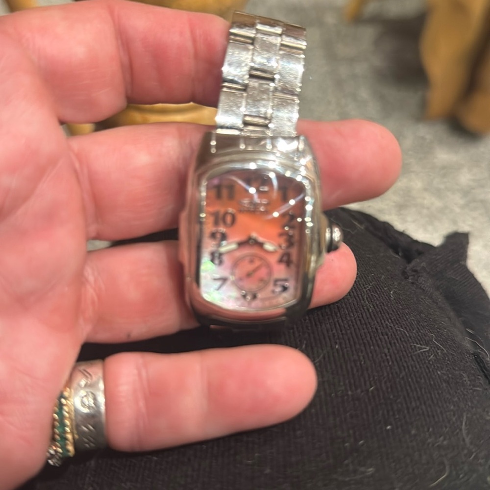 Silver and Pink women’s lupah
By invicta model 2858